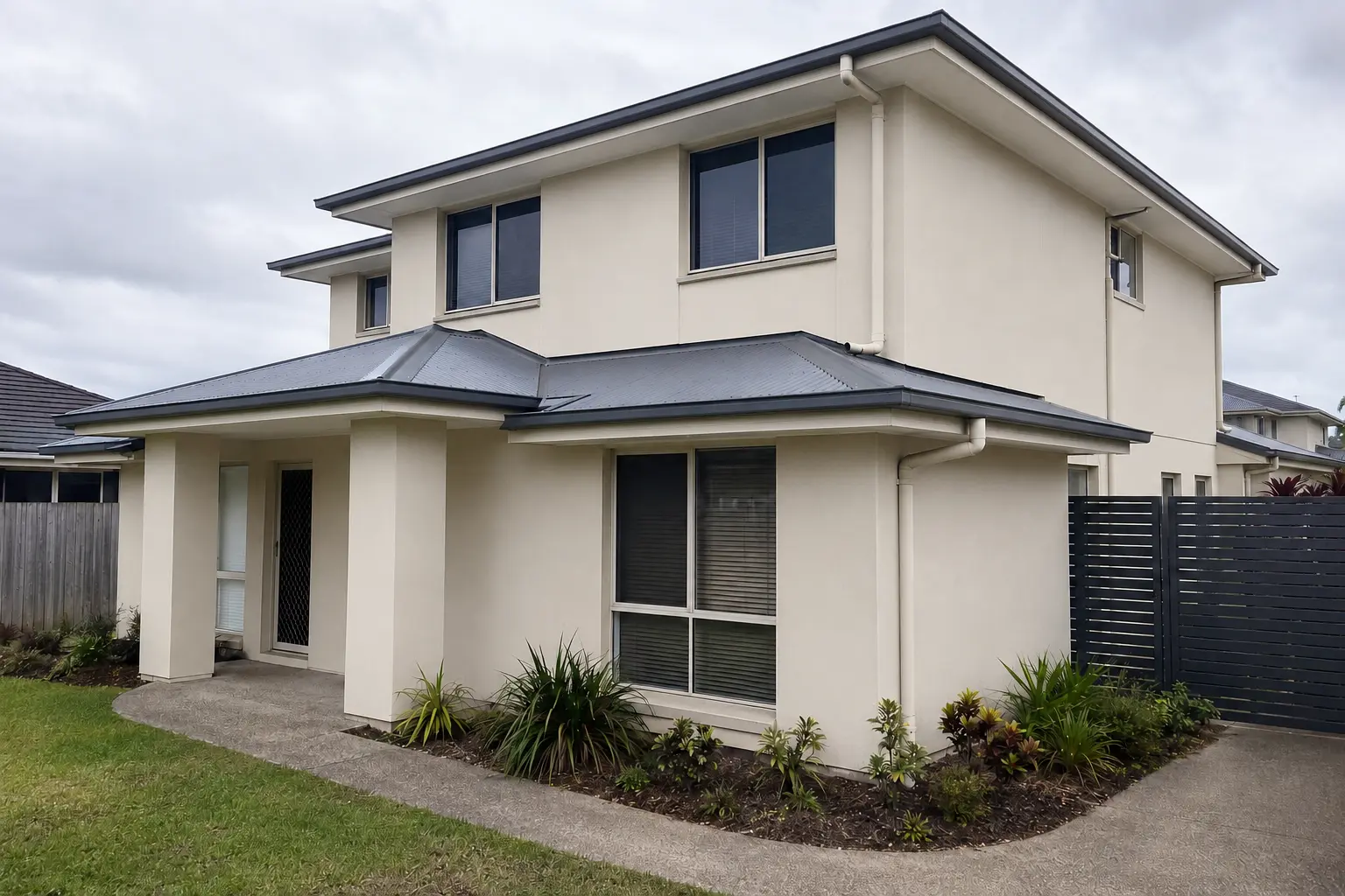 Freshly washed rendered exterior of a Queensland home